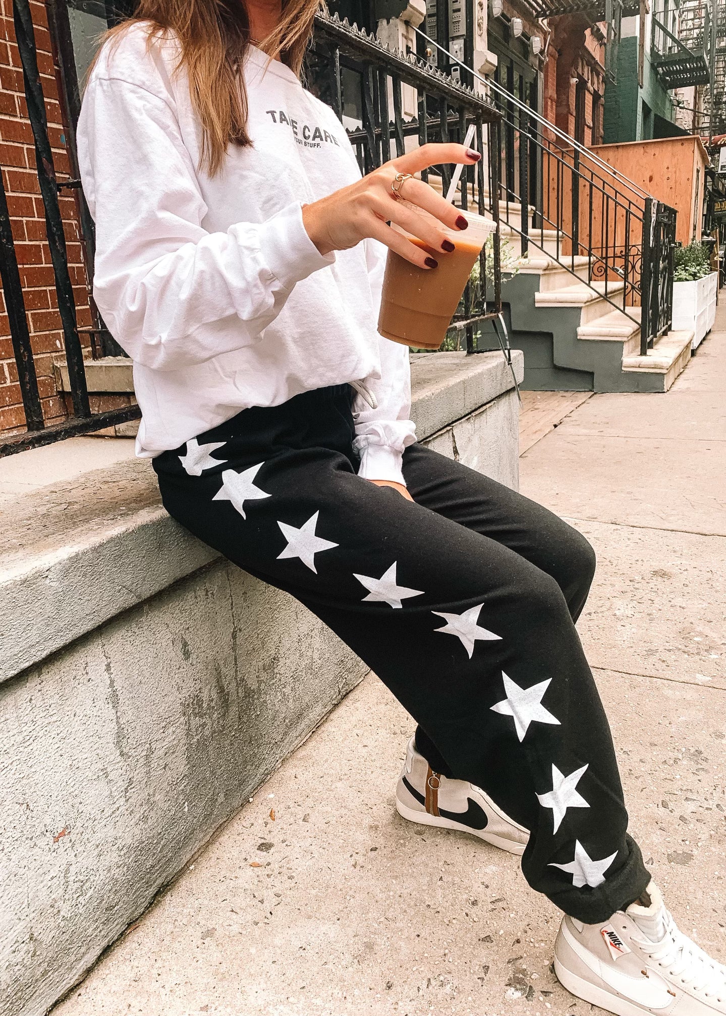 Black sweatpants online with white stars